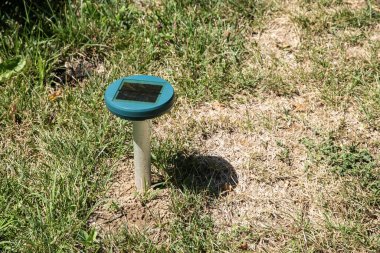 Ultrasonic Solar Mole Repeller On Grass Garden Soil