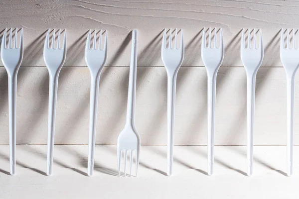 Row Disposable Plastic Forks Wall Cast Shadow Back Surface Made — Stock Photo, Image
