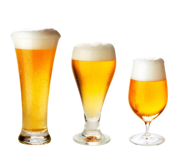 Set of many beer glasses with different beer isolate on white