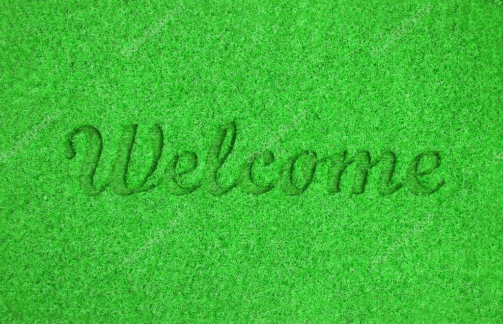 Green welcome mat Stock Photo by ©ozaiachinn 81864120