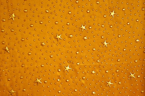 Fabric gold stars background — Stock Photo, Image