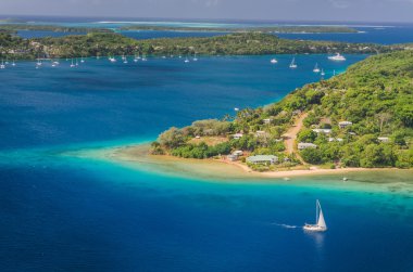 Yacht cruising Kingdom of Tonga,  from above clipart
