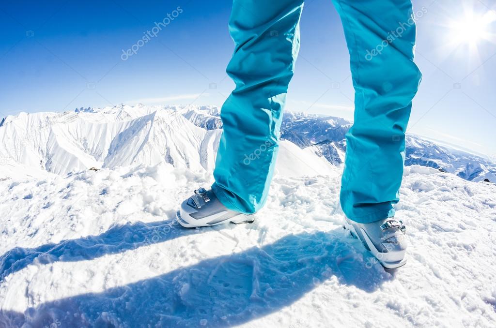 skiers at the mountaintop
