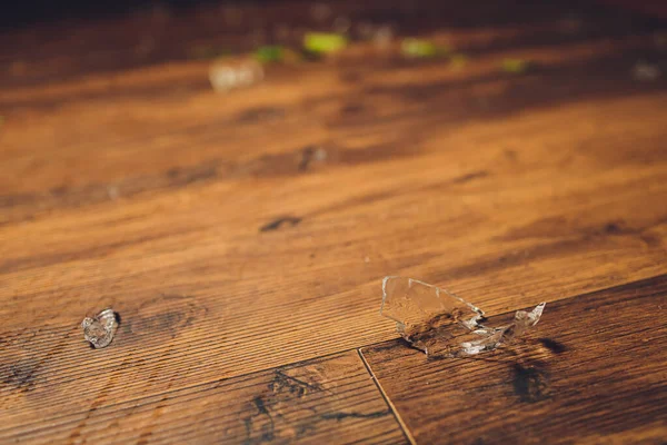 broken glass on floor. broken glass as a concept of broken life.