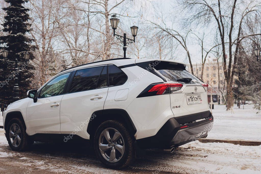 Ufa, Russia, 15 November, 2020: All-new compact crossovers Toyota RAV4 premier at Toyota car winter street