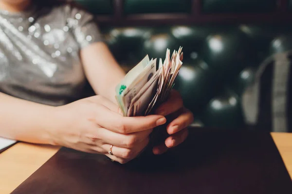 Russian rubles in the hand of a fan.male hand holding many of the Russian banknotes.The transfer of money.The isolated five-thousandth of Russian rubles denominations in a hand.