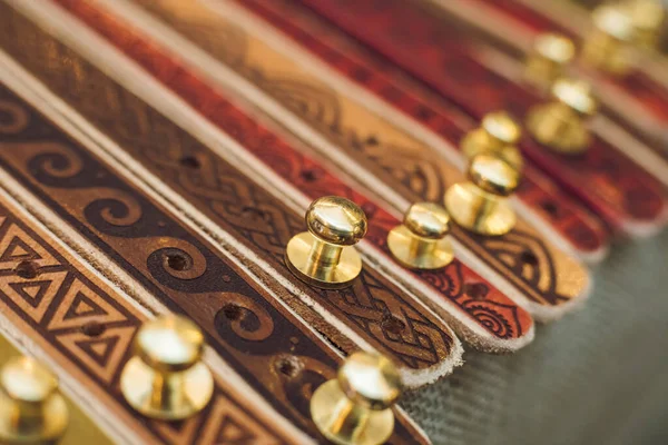 Collection of different patterns of national belarusian hand-plaited sashes. Linen belt with ornaments that hang in a row. — Stock Photo, Image