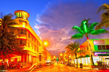 Miami Beach, Florida hotels and restaurants at sunset clipart