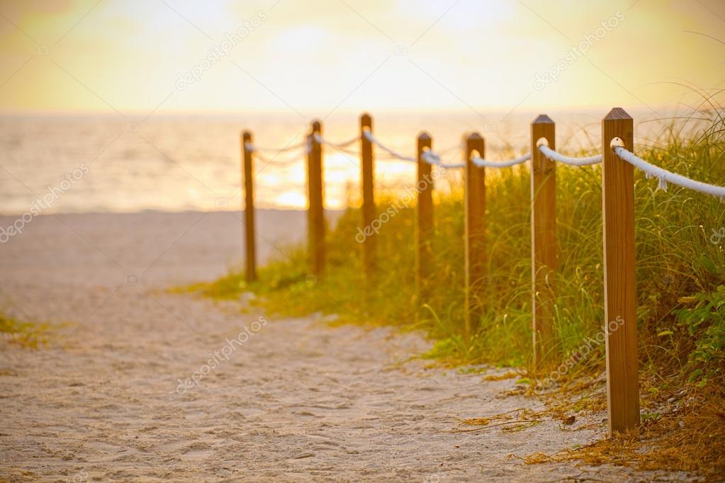 Path on the sand going to the ocean in Miami Beach Florida