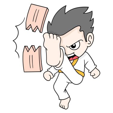 Çocuk dövüş sanatları sporcusu. Tekme pratiği yapıyor. Tahta tahtayı kırıyor, ikon resmi çiziyor.