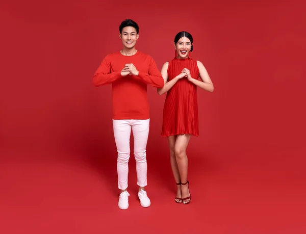 Happy Asian Couple Red Casual Attire Gesture Congratulation Greeting Happy — Stock Photo, Image