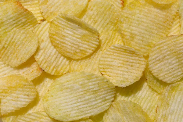 Närbild Potatistrimmiga Chips Chips Bakgrund — Stockfoto