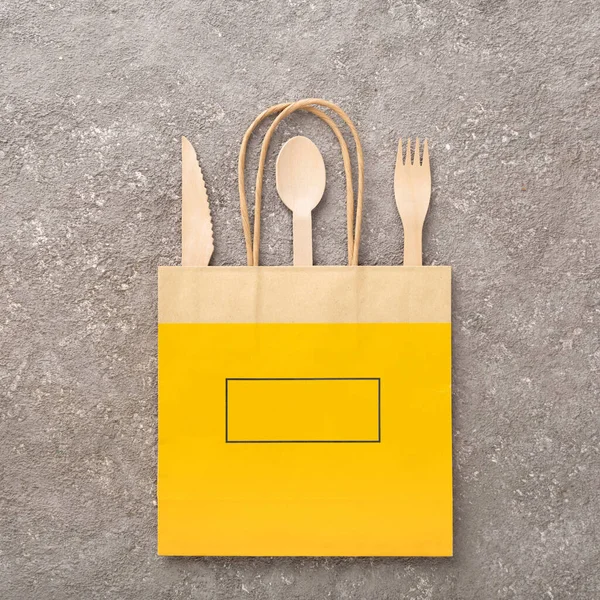 food delivery bag and eating utensils, food delivery concept in eco packaging