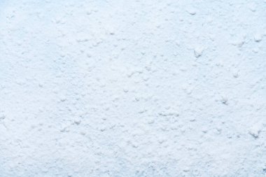 Yumuşak yüzeyi ve doğal desenleri olan beyaz kar dokusu. Yılbaşı için taze kış karı, yeni yıl