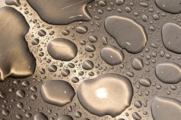 Waterdrops fırçalanmış metal — Stok fotoğraf