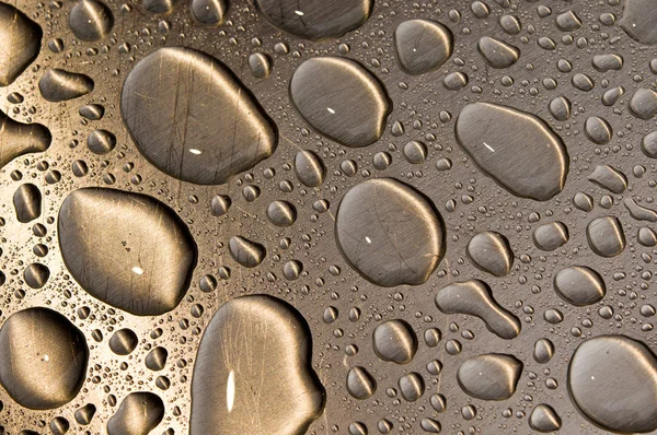 닦 았된 금속에 물방울 — 스톡 사진