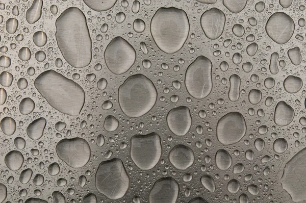 Waterdrops fırçalanmış metal — Stok fotoğraf