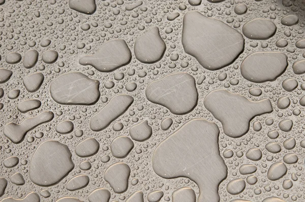 Waterdrops fırçalanmış metal — Stok fotoğraf