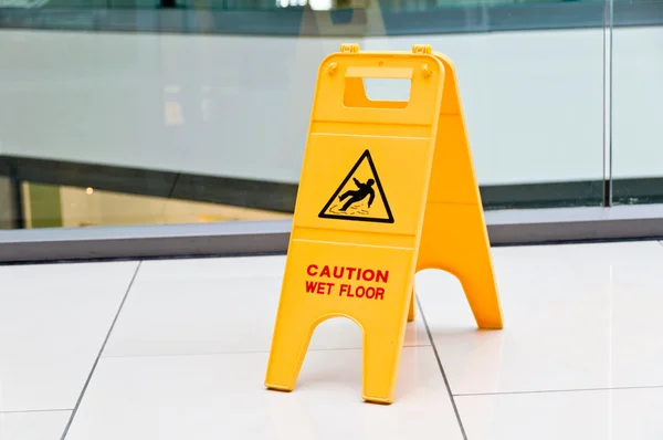 Warning sign slippery — Stock Photo, Image