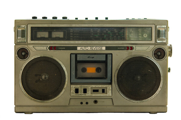 Old radio tape-recorder isolated in white background
