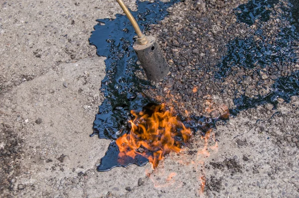 道路や高速道路の舗装のメンテナンス — ストック写真