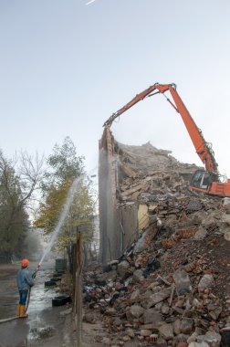 Demolition of buildings in urban clipart