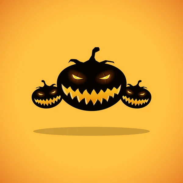 Silhouettes of Halloween pumpkins — Stock Vector