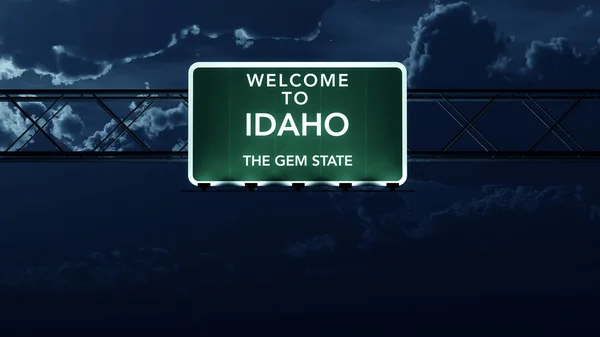 Штату Айдахо-США Ласкаво просимо дорожній знак шосе на ніч — стокове фото