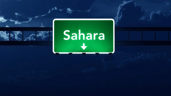 Sahara afrika autobahnschild in der nacht — Stockfoto