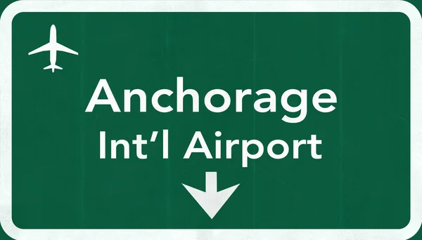 Znak drogowy Anchorage Usa międzynarodowego lotniska autostradą — Zdjęcie stockowe