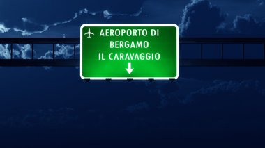 Bergamo Italy Airport Highway Road Sign at Night clipart