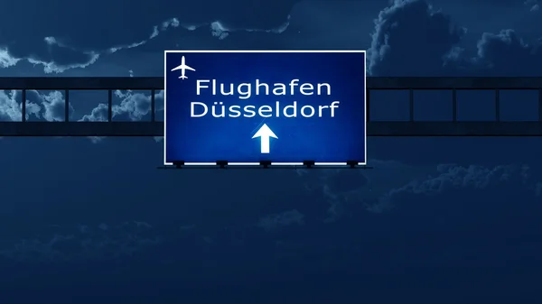 Дюссельдорф Німеччина відлітають дорожній знак вночі — стокове фото