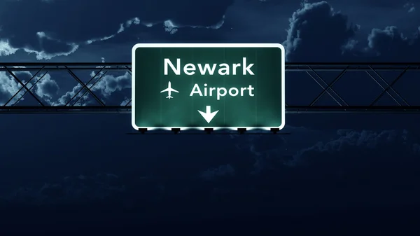 Új Jersey Usa Airport Highway jel éjjel — Stock Fotó