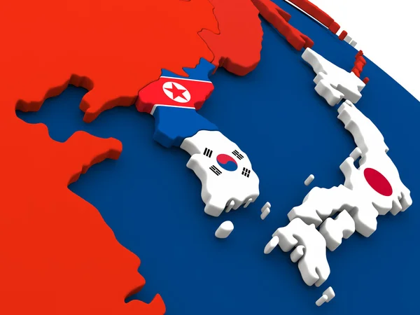 Zuid-Koreaanse en Noord-Korea op wereldbol met vlaggen — Stockfoto