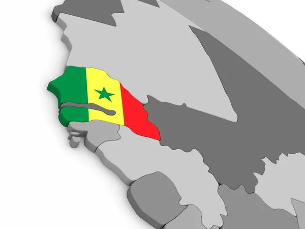 Senegal auf Globus mit Fahne — Stockfoto