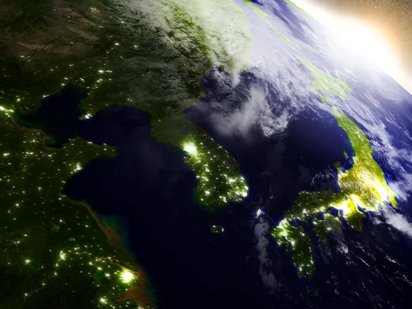 Południowokoreański i Korea Północna z kosmosu podczas wschodu słońca — Zdjęcie stockowe
