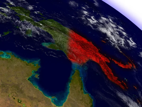 Papúa Nueva Guinea desde el espacio resaltado en rojo — Foto de Stock