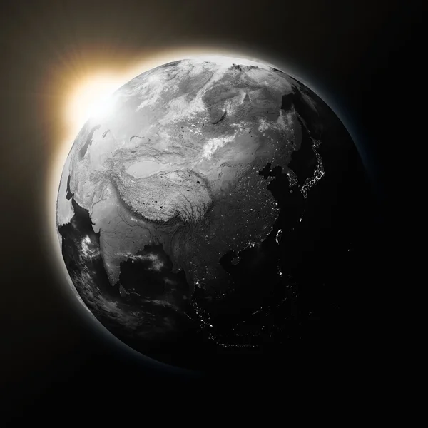 Sun over Southeast Asia on dark planet Earth — Stock Photo, Image