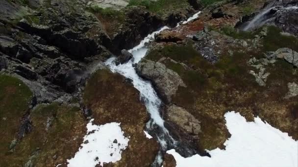 Flying over amazing tall waterfall in Norway, aerial footage — Stock Video