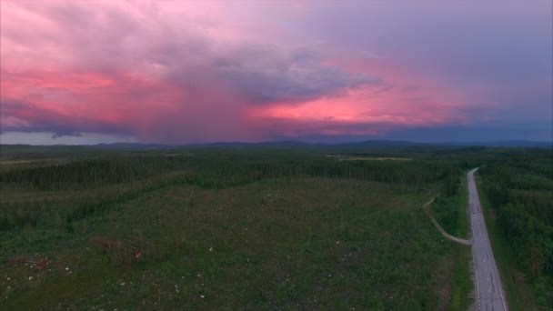 Aerial view of storm clouds by sunset — Stock Video