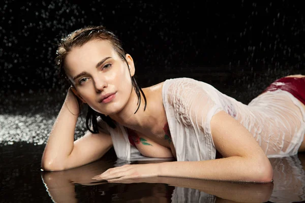 Portrait of a girl in wet shirt — Stock Photo, Image