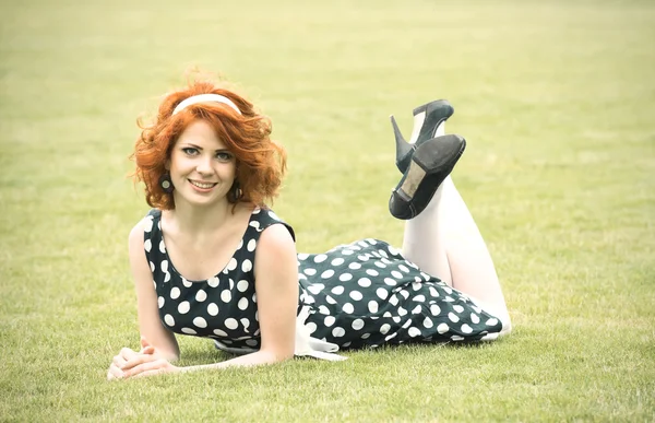 Girl lying on the grass — Stock Photo, Image