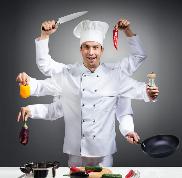 Chef con muchas manos —  Fotos de Stock