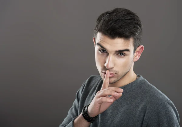 Man making a silence gesture — Stock Photo, Image