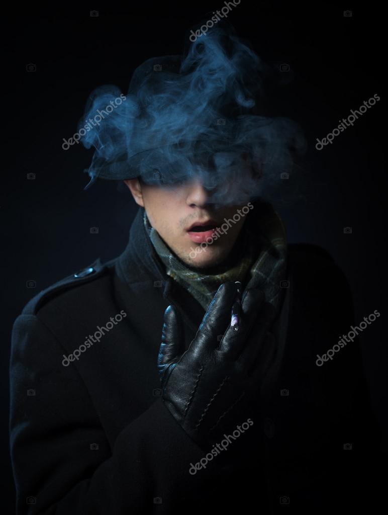 Man smoking the electronic hookah pen Stock Photo by ©rod_julian 86962886