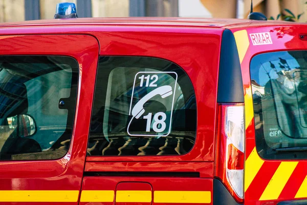 Reims France December 18, 2020 View of a red French fire truck in intervention in front of the Reims cathedral during the coronavirus pandemic affecting France and the lockdown of the country