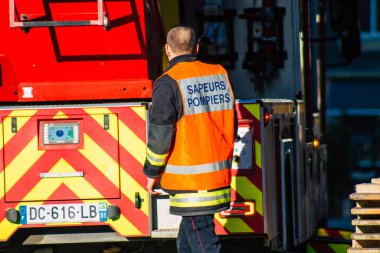 Reims France December 18, 2020 View of a traditional French fire fighter in intervention in front of the Reims cathedral during the coronavirus pandemic affecting France