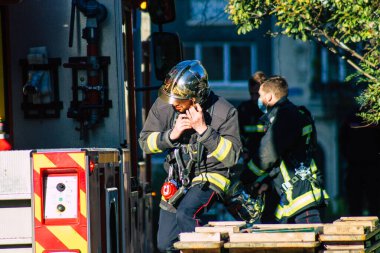 Reims France December 18, 2020 View of a traditional French fire fighter in intervention in front of the Reims cathedral during the coronavirus pandemic affecting France