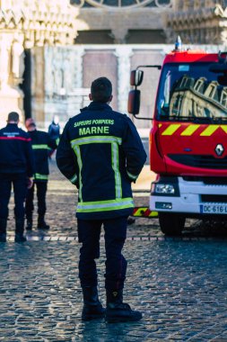 Reims France December 18, 2020 View of a traditional French fire fighter in intervention in front of the Reims cathedral during the coronavirus pandemic affecting France