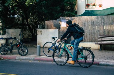 Tel Aviv Israel December 22, 2020 View of unidentified people rolling through the streets of Tel Aviv during lockdown and the Coronavirus outbreak hitting Israel